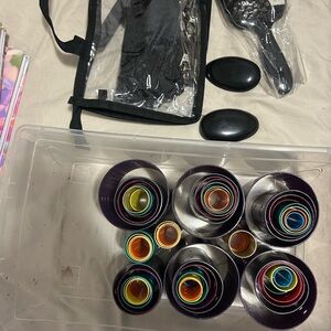 Set of hair styling tools, including brushes, combs, and 75pcs rollers